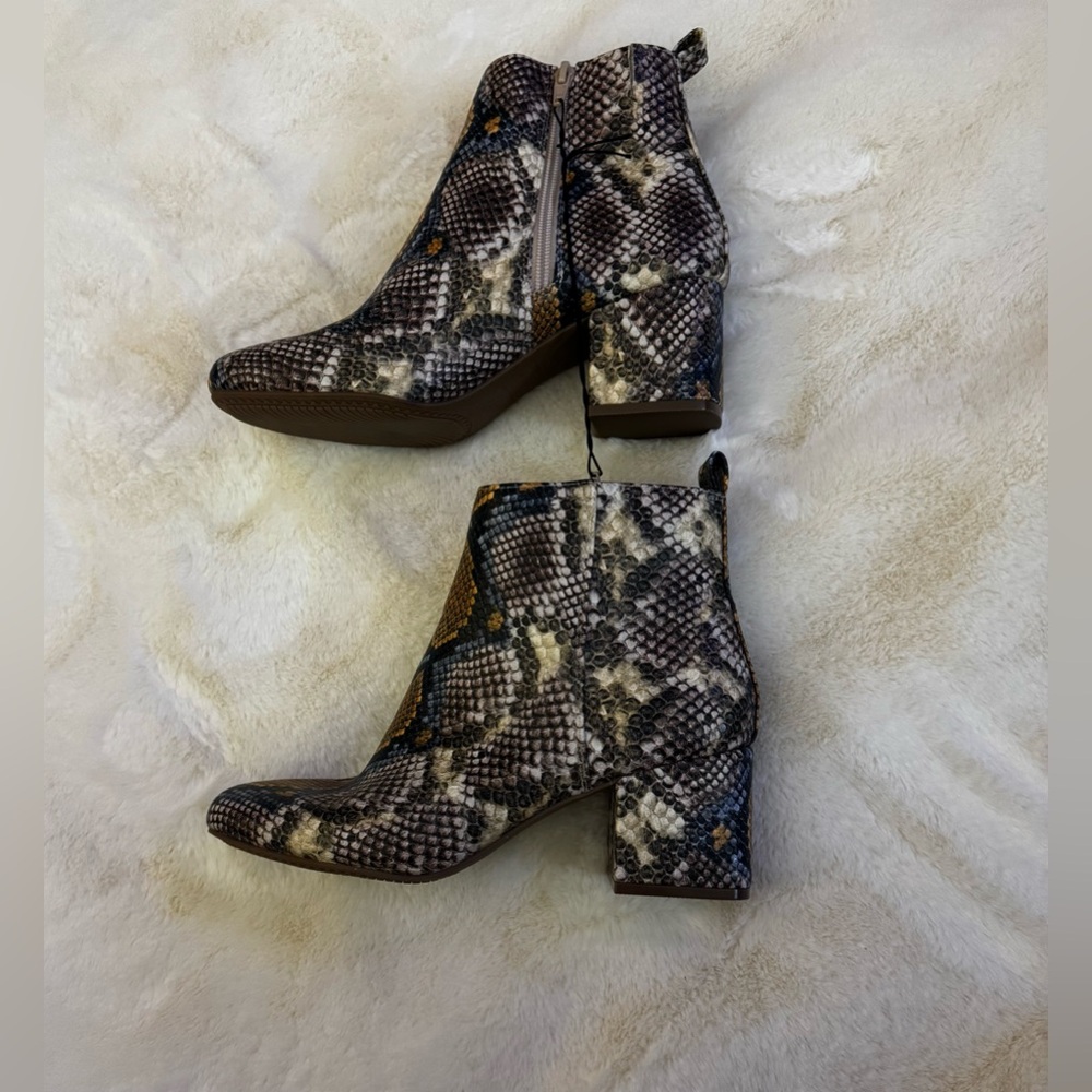 Brand new  with tags .Women Snake Print Ankle Boots